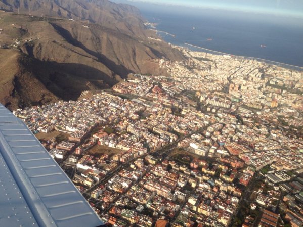 Descending over capital city Santa Cruz de Tenerife.
