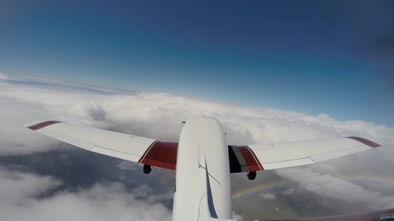 Cloudsurfing over La Palma and the rainbow